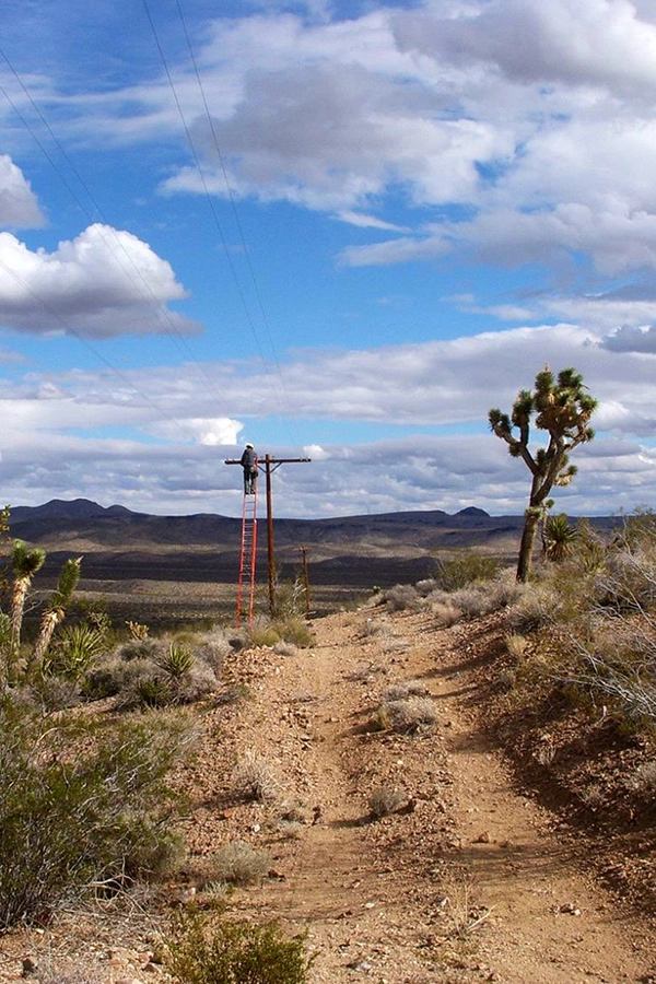 working on power line in desert